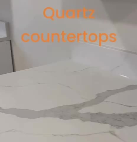 Finished white quartz countertop installed in a kitchen